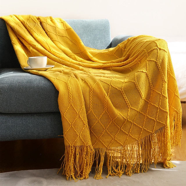 Aconchego e estilo: como as mantas podem transformar a decoração da sua casa?