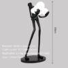 preto-c-180cm-homem-segurando-6-esferas
