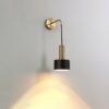 Lumin-ria-de-cabeceira-ajust-vel-moderno-lumin-ria-de-parede-preto-dourado-luxuoso-n-rdico-1 Arandela dourada e preta industrial