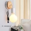 Lumin-ria-de-parede-led-com-tomada-arte-em-ferro-moderna-simples-lumin-ria-de-parede-1 Arandela vintage bulbo incandescente