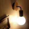 Lumin-ria-de-parede-led-com-tomada-arte-em-ferro-moderna-simples-lumin-ria-de-parede Arandela vintage bulbo incandescente