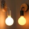 Lumin-ria-de-parede-led-com-tomada-arte-em-ferro-moderna-simples-lumin-ria-de-parede-3 Arandela vintage bulbo incandescente