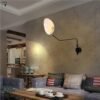 Lumin-ria-de-parede-pendente-com-hastes-articuladas-de-estilo-industrial-para-ambientes-internos-sala-de-4 Arandela aranha design industrial