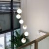 Modern-simple-staircase-chandelier-Nordic-led-ball-chandelier-villa-attic-lamp-living-room-bedroom-kitchen-family Miresa Lustre bola vidro escada