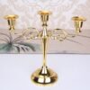 Velas-retr-banhadas-a-ouro-bronze-candelabros-com-3-bra-os-para-decora-o-de-casa-3 Candelabro metal banhado p/ 3 velas