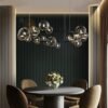 Criativo-moderno-lustre-de-metal-ilumina-o-7-10-bolhas-vidro-claro-longo-g9-redondo-lumin-2 Lustre jabuticaba bola vidro