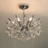 1 lustre de cristal redondo transparente e metal cromado marca miresa Lustre luxo de cristal k9