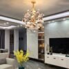 Luz-de-cristal-luxo-dandelion-lustres-pingente-l-mpada-para-sala-estar-da-sala-jantar-do-1 Lustre Dourado Replica Dandelion Estrela