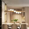 Bola-moderna-lustre-criativo-longo-tipo-sala-de-jantar-ilumina-o-lustre-luzes-penduradas-para-sala-1 Lustre retangular longo bolas vidro