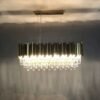 lustre Dourado de cristal redonda para sala de TV Lustre Acabamento Aço Inoxidável e Cristal K9