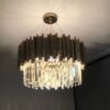 lustre redondo Dourado de cristal redonda para sala de TV Lustre Acabamento Aço Inoxidável e Cristal K9