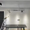 S415c9a847e8a4bfc8ebb4a741905ca74i Lustre Minimalista Com Spot Para Mesa Comprida