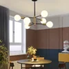 Nordic-e27-lustre-casa-ouro-preto-decora-o-do-teto-luz-moderna-sala-de-estar-quarto-1 Lustre Moderno Preto e Dourado Com Lâmpada Aparente