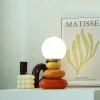 USB-Cer-mica-Criativa-Pequena-Luz-Noturna-Candeeiro-de-mesa-Quarto-Night-Stand-Luz-de-alimenta-1 Abajur Moderno Despojado USB Cerâmica Cúpula Bola Branca Leitosa