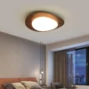 LED-Nordic-Wooden-Ceiling-Light-Living-Bedroom-Study-Rooms-Logs-Pebble-Walsnut-Acrylic-Entrance-Hallway-LED-2 Luminária Sobrepor Circulo Irregular Base Acabamento Madeira