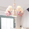 Lustres-carrossel-rosa-para-quarto-de-crian-as-candeeiro-do-quarto-da-princesa-moderno-rom-ntico-1 Luminária Infantil Lustres Carrossel Rosa