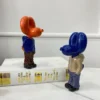 SAAKAR-Estatuetas-de-Resina-Bolso-Bal-o-Rua-Tend-ncia-Decora-o-de-Arte-Est-tua-2 Estatuetas Cultura Pop Cão Humanoide De Resina Forma De Balão
