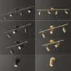 Moderna-lumin-ria-de-teto-LED-Long-Spotlight-Fixture-Ilumina-o-para-sala-de-estar-Loja-1 Spot Trilho Eletrificado Dourado E27