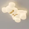 Moderno-Simples-Urso-Luzes-de-Teto-Vento-Creme-Branco-Decora-o-LED-Quente-Rom-ntico-Quarto-1 Luminária Sobrepor Urso Creme Branco
