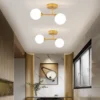 Nordic-Ball-LED-Teto-L-mpada-Ilumina-o-Interior-para-Quarto-Sala-de-Estar-Mesa-de-1 Luminária Sobrepor Moderna Com Bola De Vidro Brancas