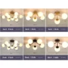 COCO-Bola-de-vidro-branco-Luzes-de-teto-lustre-moderno-preto-e-dourado-corpo-da-l-3 Luminária Sobrepor Bolas Vidro Brancas