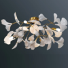 luminaria-sobrepor-plafon-dente-de-leao-galho-arvore-estrutura-dourado-e-folhas-brancas-modelo-2024-2025-marca-miresa Luminária Sobrepor Folha De Ginkgo Acrílica 2024/2025