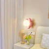 kf-S0ad6ca1937964851b8636ab0d78f1933f-Kid-s-Room-LED-Wall-Lamp-Modern-Resin-Body-Flower-Style-Bedroom-Living-Room-Restaruant-Decor Luminária Parede Infantil Flor Branca ou Rosa