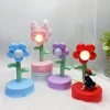 kf-Sa8d62365c4fa469f9fadba05312cc44a6-Mini-LED-Flower-Night-Lamp-Desktop-Ornament-Cartoon-Cute-Ambient-Lights-Lovely-Portable-Bedside-Light-Children Luminária Mini LED Flor