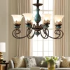 kf-Sb22ccd2d57494b8eb54235857f676e614-European-Vintage-Ceramic-Chandelier-Lights-Living-Room-Bedroom-Antique-Classic-Design-Metal-Iron-Arm-Glass-Lampshade Lustre Cerâmica Vintage Europeu