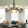 kf-Sc02fbda3390e46829fa7d91c6f20916fv-European-Vintage-Ceramic-Chandelier-Lights-Living-Room-Bedroom-Antique-Classic-Design-Metal-Iron-Arm-Glass-Lampshade Lustre Cerâmica Vintage Europeu