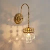 kf-Sd052e0ef809645818cee450e07698d588-French-Classical-Crystal-Wall-Lamp-American-Country-Iron-Art-Light-Luxury-Bedroom-Living-Room-Aisle-Bedside Arandela Lustre Dourado Francês e Cristal K9