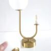 lumianria-sobrepor-dourada-com-bolas-de-vidro-branca-marca-miresa Luminária Sobrepor Moderna De Alumínio e Bolas de Acrílico Para Salas, Quartos e Lavabos