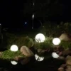 kf-Hcaa751083e1c4ee2a0351b12c6077018g Luminária Área Externa Luz Solar Bola Plástico Bateria Lítio