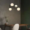 kf-S975aac86a7424896b0d9eabc67cd0706X-Nordic-Creative-Glass-Ball-Chandelier-Circular-Living-Room-Bedroom-Light-Children-s-Study-Clothing-Store-Restaurant Lustre Argola De Alumínio e Bolas De Vidro Brancas