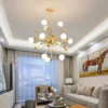kf-Sbcbde883ae254b7c915bfd424863925eJ-Modern-Global-Led-Chandelier-Kitchen-Restaurant-Living-Room-Pendant-Lamp-Organic-Glass-Acrylic-Artificial-Satellite-Decor Lustre Orgânico Molécula Dourado e Bolas Brancas De Vidro