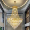 Lustre Dourado Duplex Cristal K9 Translúcido Pé Direito Duplo Para Escadas: lustre de cristal dourado duplex, oferecido pela Miresa, loja-de-luminárias-São-Paulo.