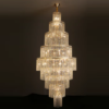 Lustre Grande Para Escadas Argolas Com Cascata Cristais K9 | Miresa | loja-de-luminárias-São-Paulo Lustre Grande Para Escadas Argolas Com Cascata Cristais K9: lustre grande escadas, oferecido pela Miresa, loja-de-luminárias-São-Paulo.