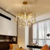 kf-S0c8d21e8c2ca42dab0477424c9f01eeaq-Luxo-led-lustre-n-rdico-6-8-12-cabe-a-k9-de-cristal-luz-do-candelabro Lustre Dourado Moderno Galhos Com Gotas Cristais Asfuor K9