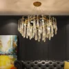 kf-S4a9741e790bf47e8a9cc64b201c4f56eA-Luxo-led-lustre-n-rdico-6-8-12-cabe-a-k9-de-cristal-luz-do-candelabro Lustre Dourado Moderno Galhos Com Gotas Cristais Asfuor K9