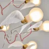 kf-Sacb0b7913d9441b1a020637c435f9d70m-Art-Living-Room-Ceiling-Light-Dining-Room-Pendant-American-Nordic-Bedroom-Pendant-Flower-Feather-Full-Copper Lustre Moderno Réplica Birdie