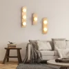 kf-S1fab138048104ce59f0d72ffc359fc38a-Retro-3-Cabe-as-Natural-Pedra-LED-L-mpada-De-Parede-Abajur-De-Vidro-Branco-Sconce Arandela Moderna Acabamento Natural Com Bolas Brancas de LED
