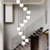 kf-S729e8bd6273744bba9522af17d4438c3P Lustre Grande Para Escadarias Duplex Forma Bola Branca