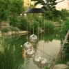 kf-S874aee734fcc41d6964b1a9c560048593-Lustre-solar-ao-ar-livre-p-tio-jardim-decorativo-prova-dwaterproof-gua-pequenas-luzes-penduradas-varanda Luminária Pendente Luz LED Solar Para Jardins