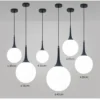 kf-S9b0b5cc361fa4514a10d64dbd1899f37I-Lumin-ria-pendente-moderna-com-bola-de-vidro-lumin-ria-pendente-de-loft-com-luz-led Pendente Bola Branca Leitosa Gota