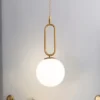 Pendente Dourado Com Bola Branca Leitosa Marca Miresa Pendente Dourado Com Bola Branca Leitosa