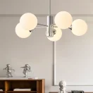 kf-S14864005a1b845f2bf3de8489ebe59100-Lustre-retro-n-rdico-moderno-para-sala-de-estar-Dinamarca-Designer-feij-o-m-gico-Bauhaus Lustre Bauhaus Medieval Bola Branca Leitosa