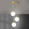 Foto de pendente Bolas Brancas Na Mesma Canopla, pendente bolas brancas, catálogo Miresa, loja-de-luminárias-São-Paulo.