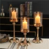 kf-S309c66aee90b442fbabde431720ec3127 Castiçais Vela De Vidro Dourado
