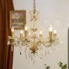 Lustre De Cristal Dourado Com Pingentes Transparentes | Miresa | loja-de-luminárias-São-Paulo Lustre De Cristal Dourado Com Pingentes Transparentes: lustre de cristal dourado pingentes, oferecido pela Miresa, loja-de-luminárias-São-Paulo.