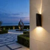 kf-S482ebe021fc943318602fb2022d33da7z Arandela Moderna Alumínio 2 Fachos de Luz IP65 Com 2 Fachos LED Para Jardins e Fachadas